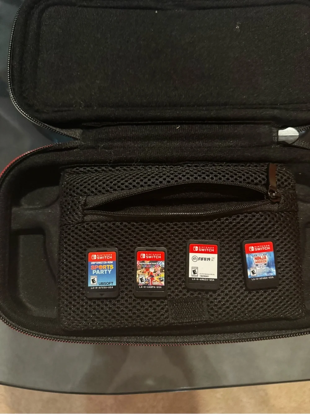 Nintendo Switch with Black Joy-Con Controllers + More
